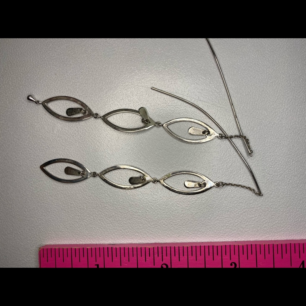 Silver Threaded Earrings with Oval Shapes